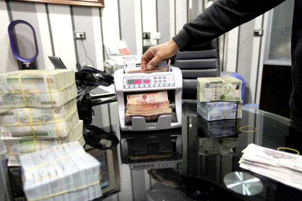 Libya devalues currency by 14.7pc